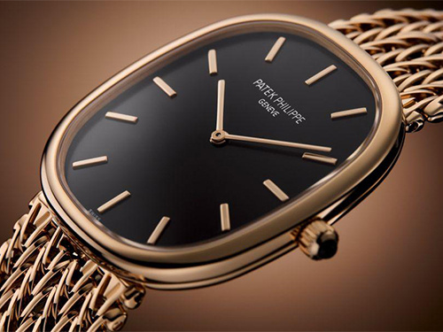 Patek Philippe представил ультратонкие часы Golden Ellipse из розового золота c браслетом-цепочкой